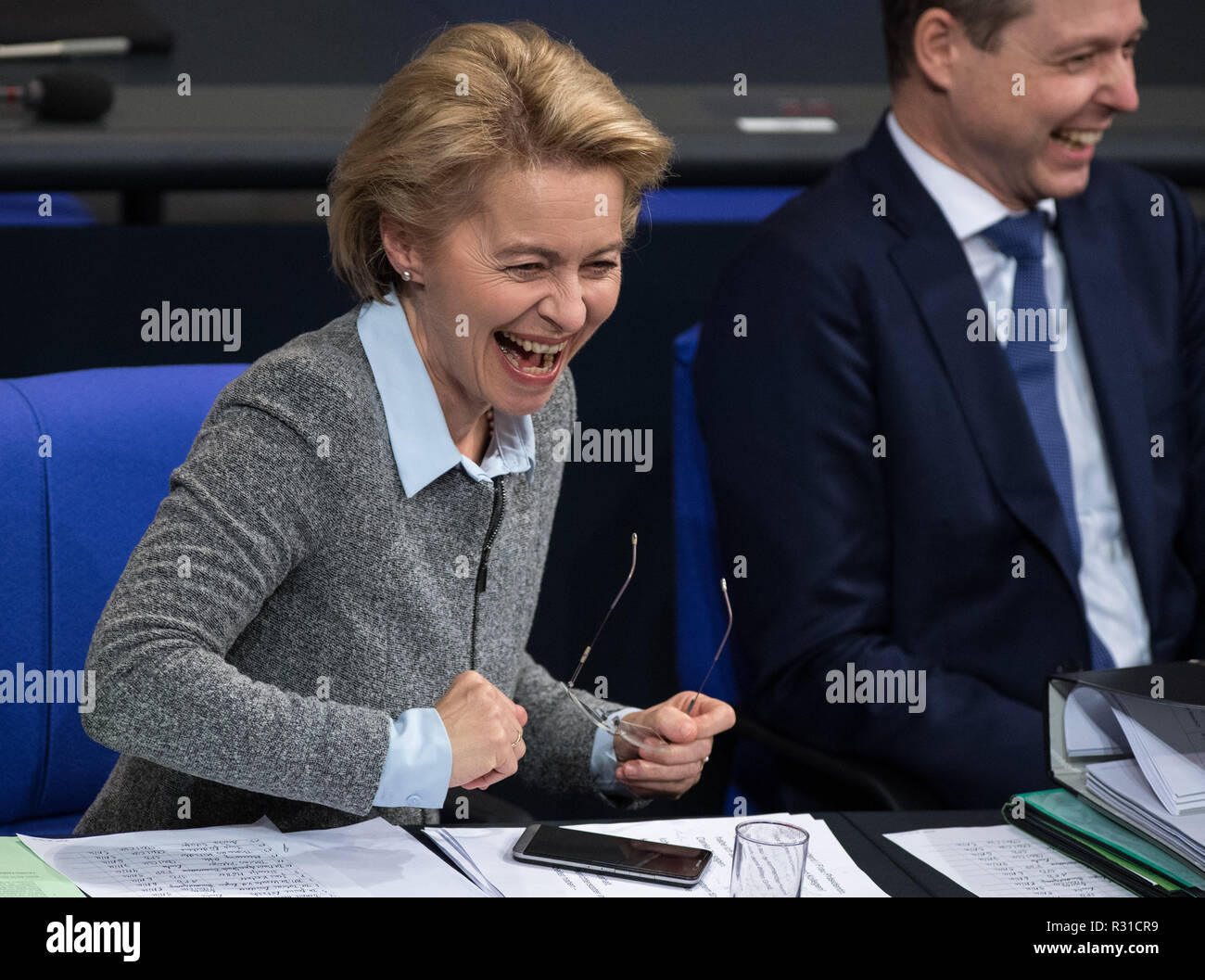 berlin-germany-21st-nov-2018-ursula-von-der-leyen-cdu-federal-minister-of-defence-laughs-during-the-general-debate-in-the-bundestag-when-she-is-compared-by-mp-pflger-die-linke-to-the-caterpillar-nimmersatt-the-debate-on-the-budget-of-the-ministry-of-defence-is-on-the-agenda-during-the-budget-discussions-credit-soeren-stachedpaalamy-live-news-R31CR9.jpg