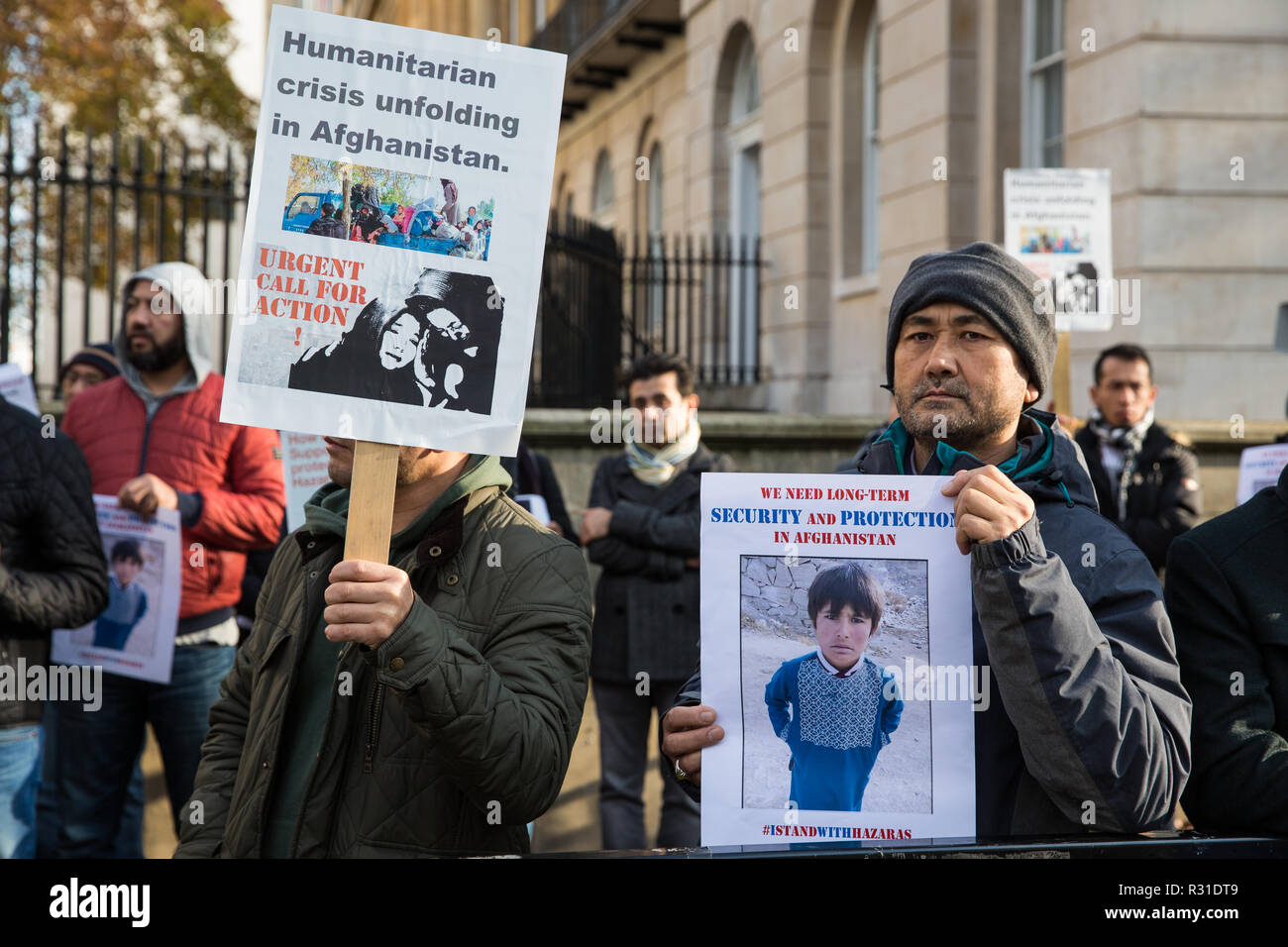 London, UK. 21st November, 2018. Members of the Hazara community, an ethnic group native to the region of Hazarajat in central Afghanistan, protest opposite Downing Street against a lack of assistance from the Afghan government in the face of attacks by the Taliban and Islamic State. Credit: Mark Kerrison/Alamy Live News Stock Photo