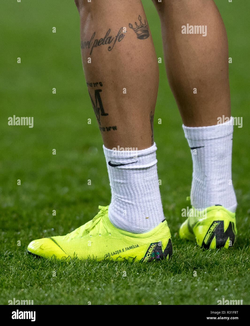 Milton Keynes, UK. 20th Nov 2018. The Nike Mercurial football boots of  Danilo (Manchester City) of Brazil displaying 'so lazer e familia' (just  leisure and family) during the International match between Brazil