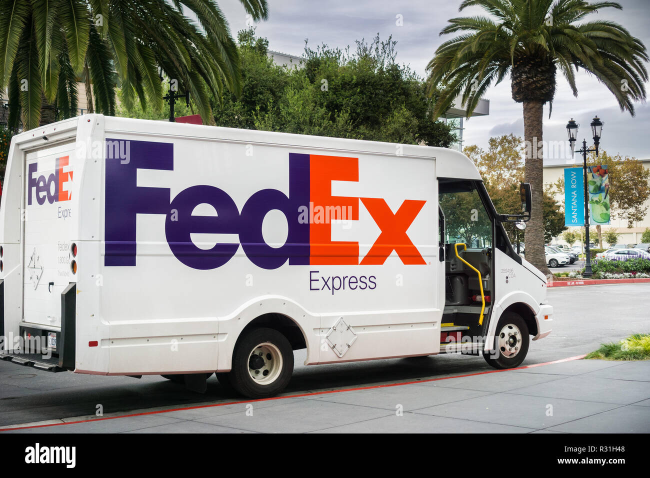 November 8, 2017 San Jose/CA/USA - FedEx Express van making deliveries in Santana Row, San Francisco bay Stock Photo