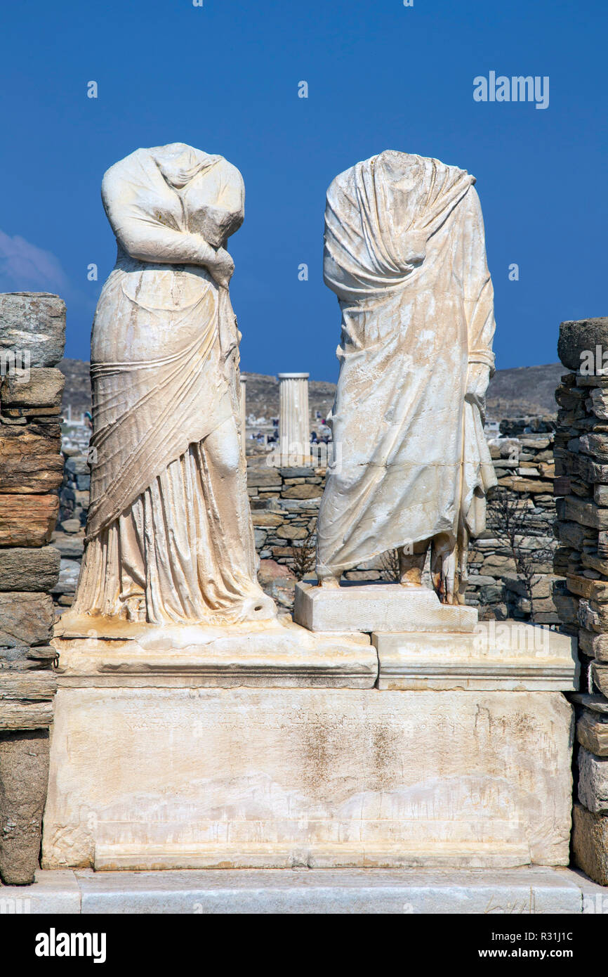 Statues, house of Cleopatra, archaeological site on museum island Delos, Cyclades, island Delos, Greece Stock Photo