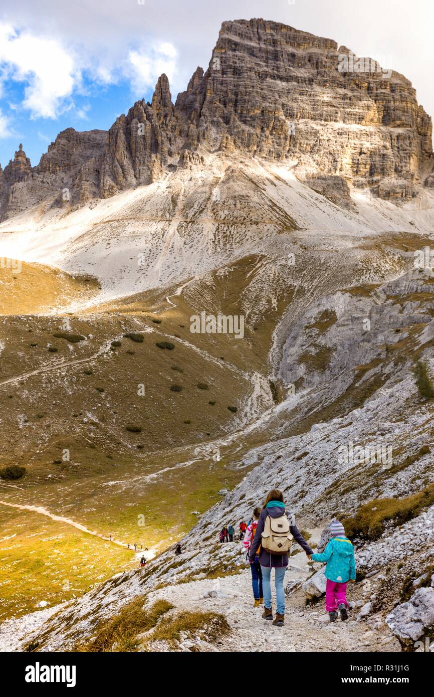 DOLOMITES, ITALY SEPTEMBER 21, 2016:view of the Tre Cime di Lavaredo and people hiker  at the Dolomites mountains. DOLOMITES, ITALY, September 21, 201 Stock Photo