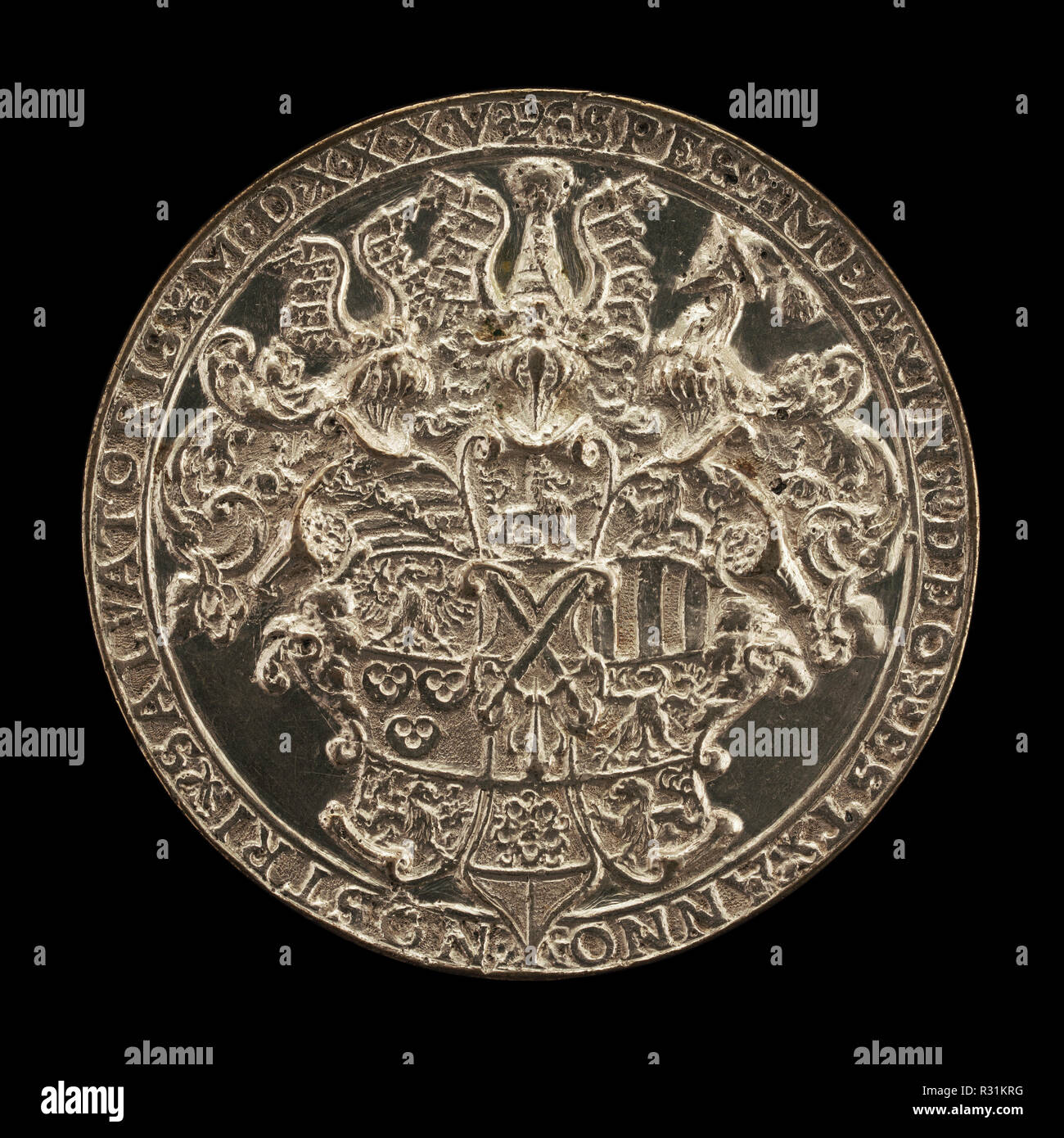 Shield with Helms and Crests [reverse]. Dated: 1535. Dimensions: overall (diameter): 6.51 cm (2 9/16 in.)  gross weight: 66.65 gr (0.147 lb.)  axis: 12:006.51. Medium: silver. Museum: National Gallery of Art, Washington DC. Author: Hans Reinhart the Elder. Stock Photo