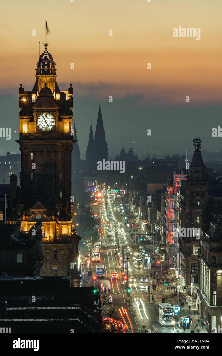 Edinburgh, Scotland. 11/18/18. View of Princess Street from Calton Hill at dusk, with lights on and beautiful color in the sky. Long exposure Stock Photo