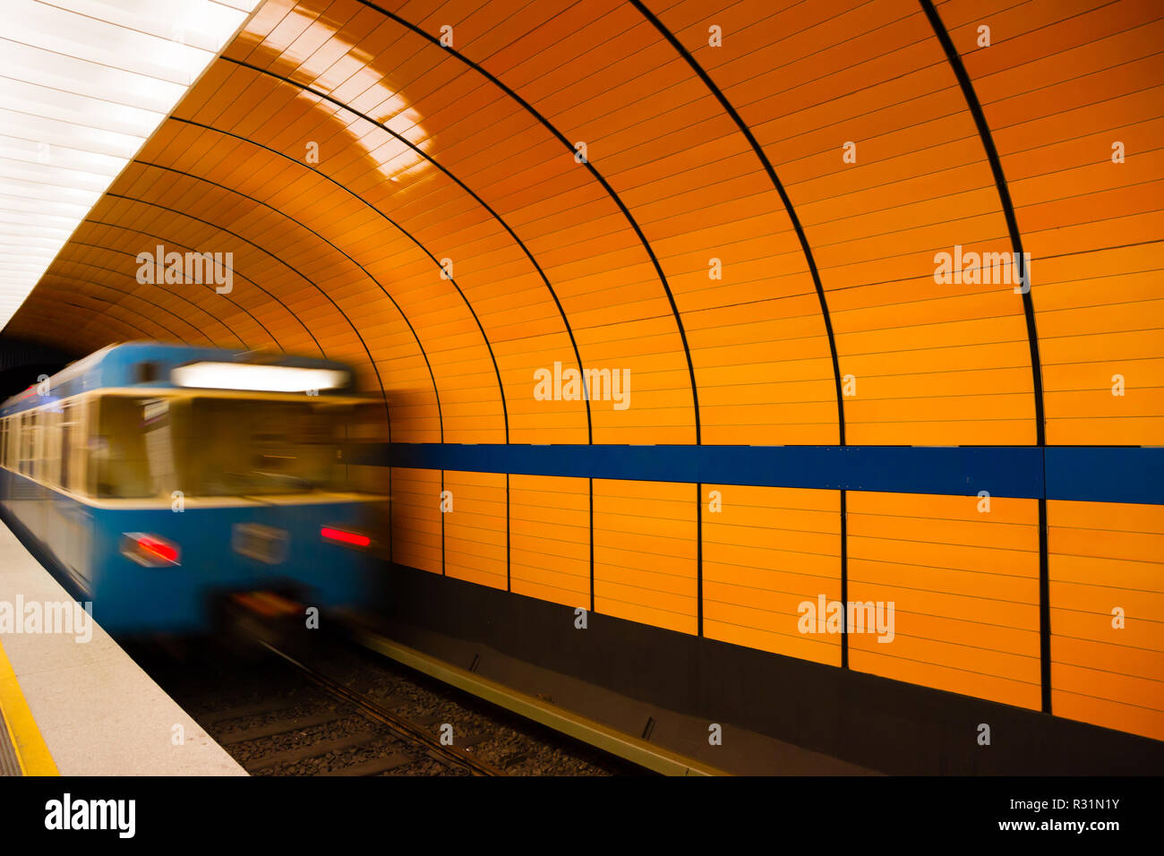 A train leaving platform in Munich underground, Germany Stock Photo