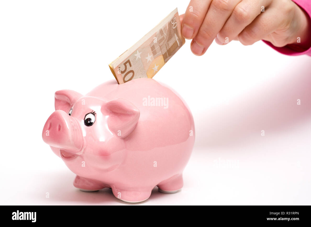 pink money box as a pig Stock Photo