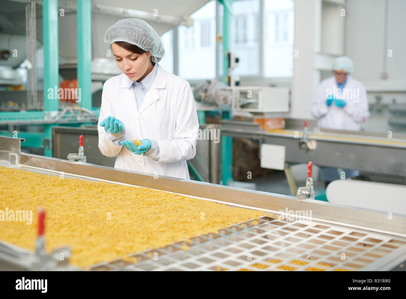 Young Worker at Factory Stock Photo