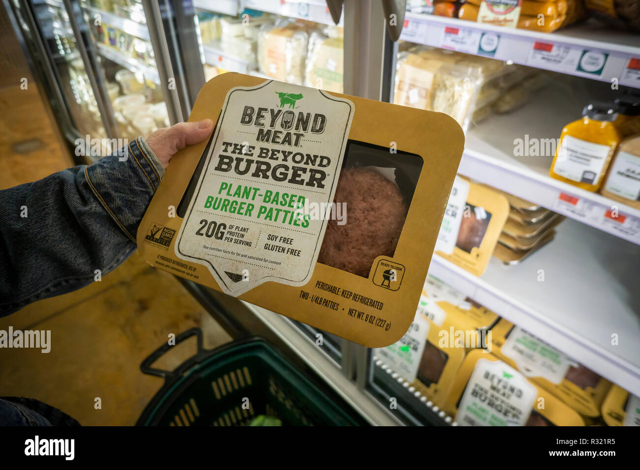 A shopper chooses a package of Beyond Meat from a freezer in a supermarket in New York on Monday, November 19, 2018. The plant-based protein start-up Beyond Meat has filed for an initial public offering for $100 million. The global market for meat substitutes is expected to grow to $6.4 billion by the year 2023, currently it is estimated at $4.6 billion. (© Richard B. Levine) Stock Photo