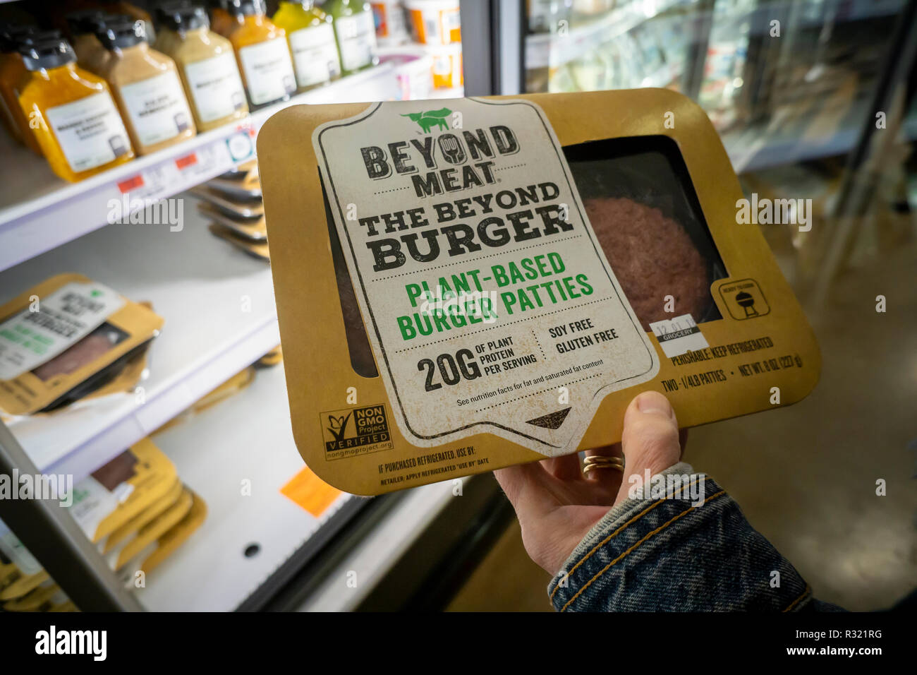 A shopper chooses a package of Beyond Meat from a freezer in a supermarket in New York on Monday, November 19, 2018. The plant-based protein start-up Beyond Meat has filed for an initial public offering for $100 million. The global market for meat substitutes is expected to grow to $6.4 billion by the year 2023, currently it is estimated at $4.6 billion. (© Richard B. Levine) Stock Photo