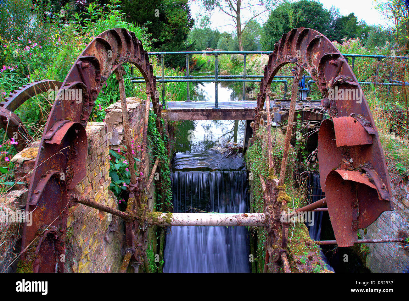 Derelict old watermill wheel at Great Bardfield, Essex Stock Photo