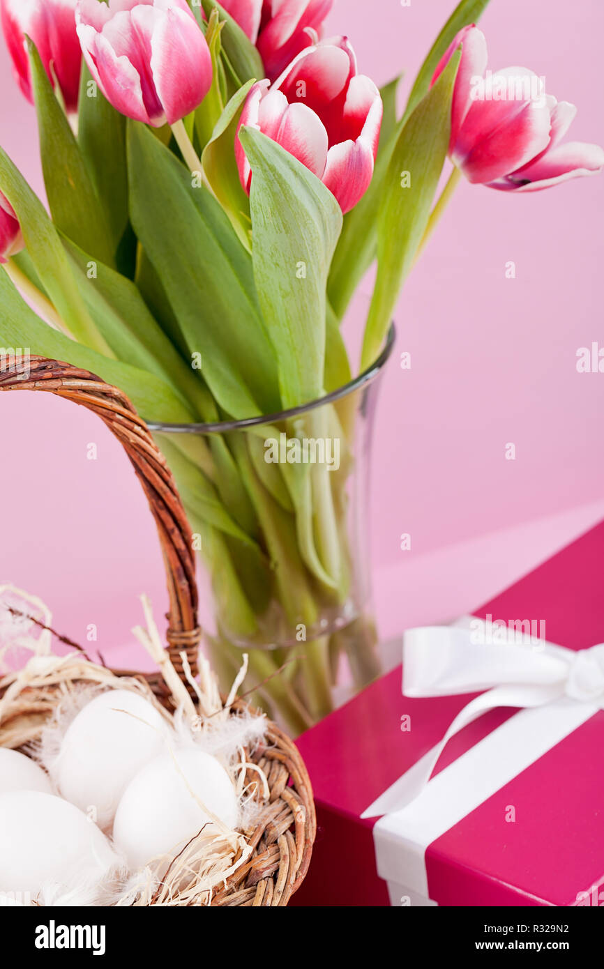 Festive Easter Egg Decoration With Basket Nest Ribbon And Tulips