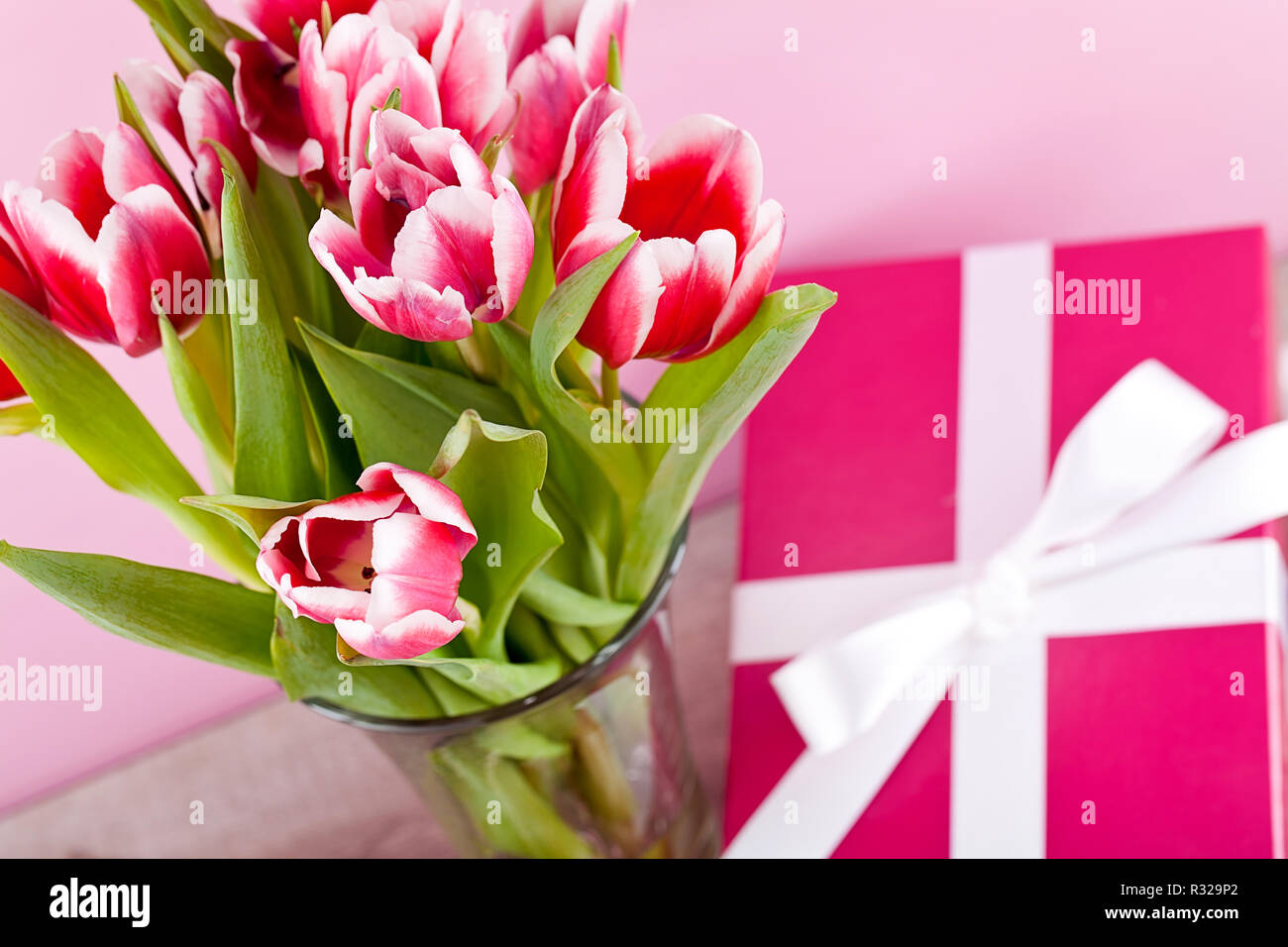 Festive Easter Egg Decoration With Basket Nest Ribbon And Tulips