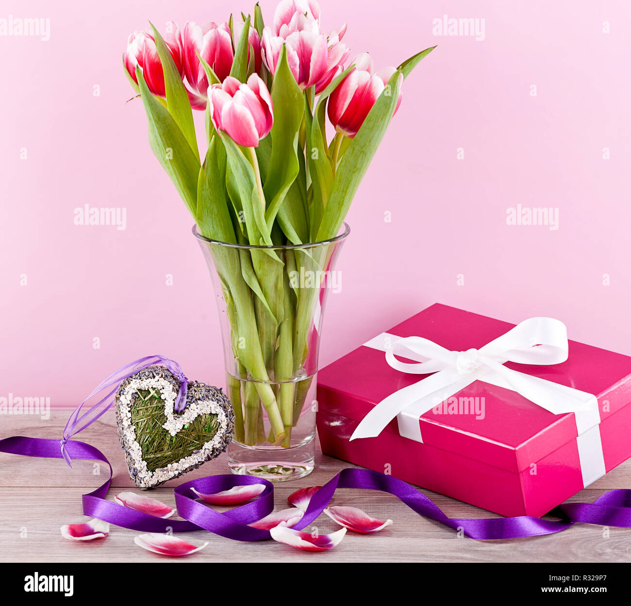 Festive Easter Egg Decoration With Basket Nest Ribbon And Tulips