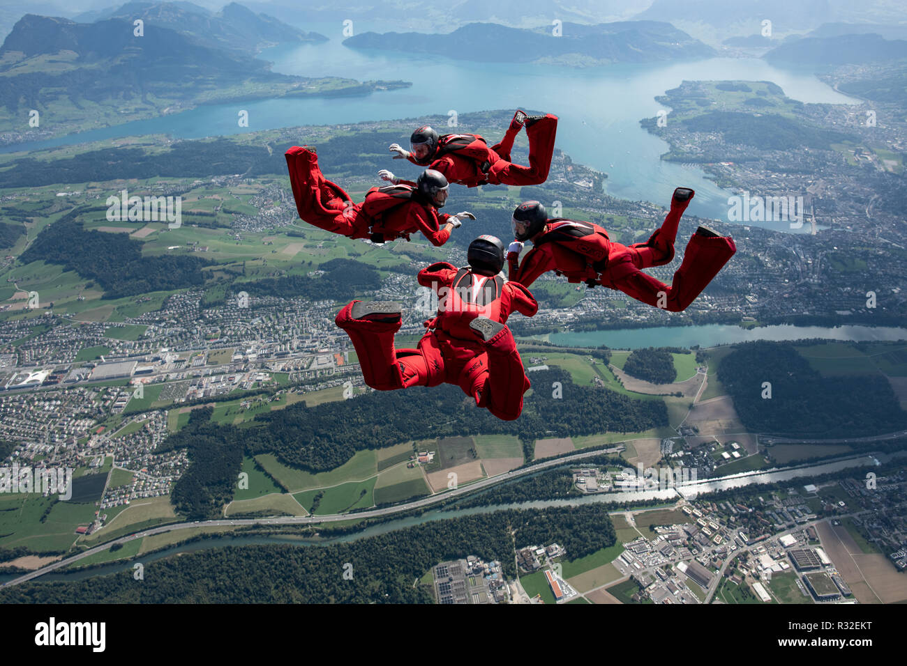 Skydiving team training in the skies above the Lucerne area Stock Photo