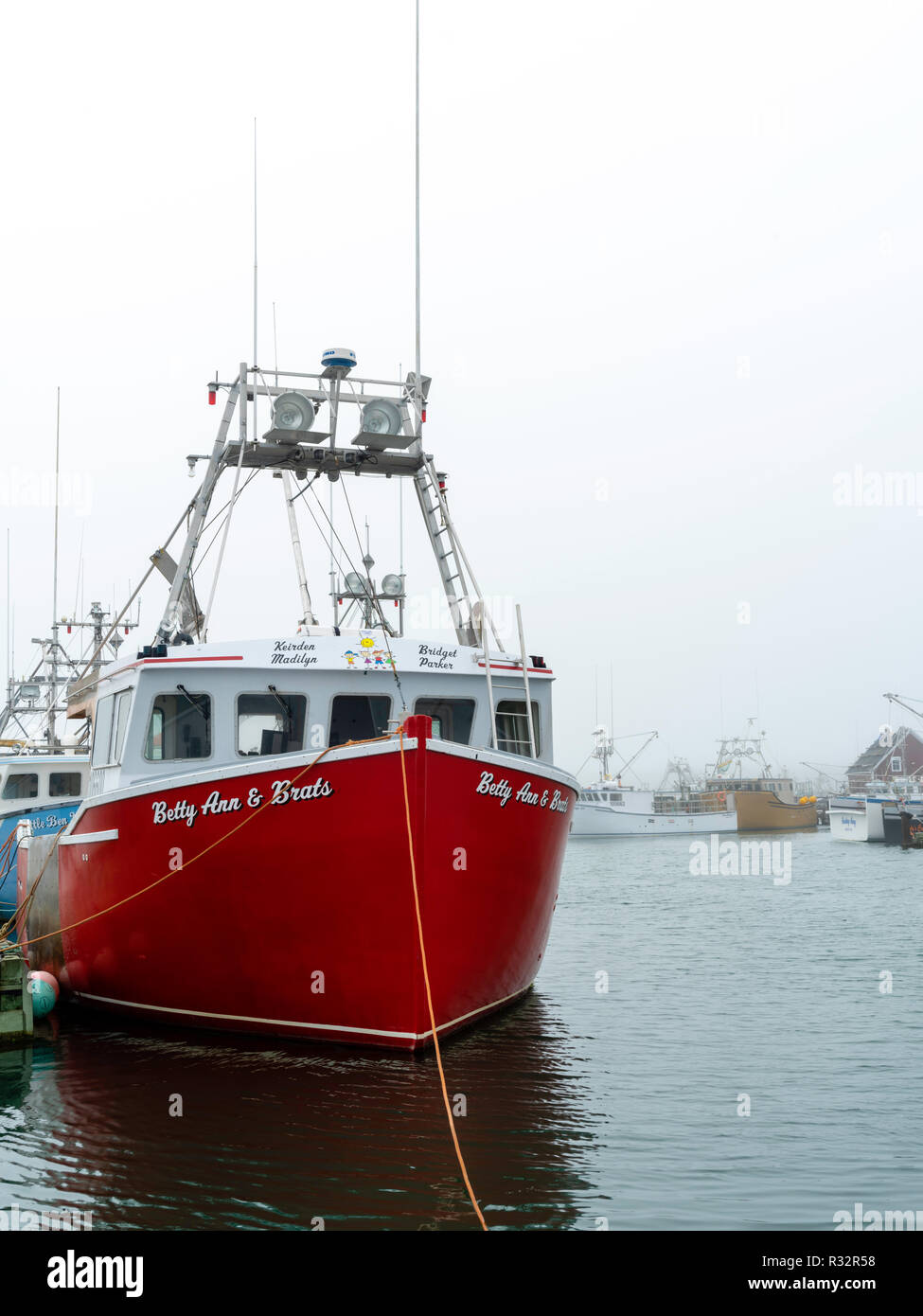 Lobster boats sit in a protected cove at Cape Forchu, Nova Scotia