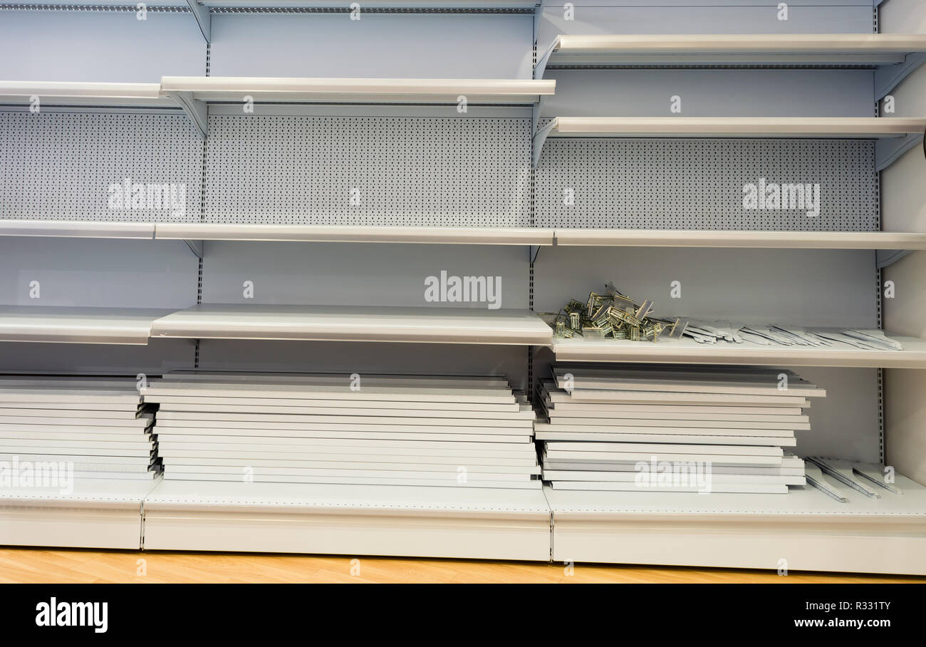 Empty shelves in store Stock Photo Alamy
