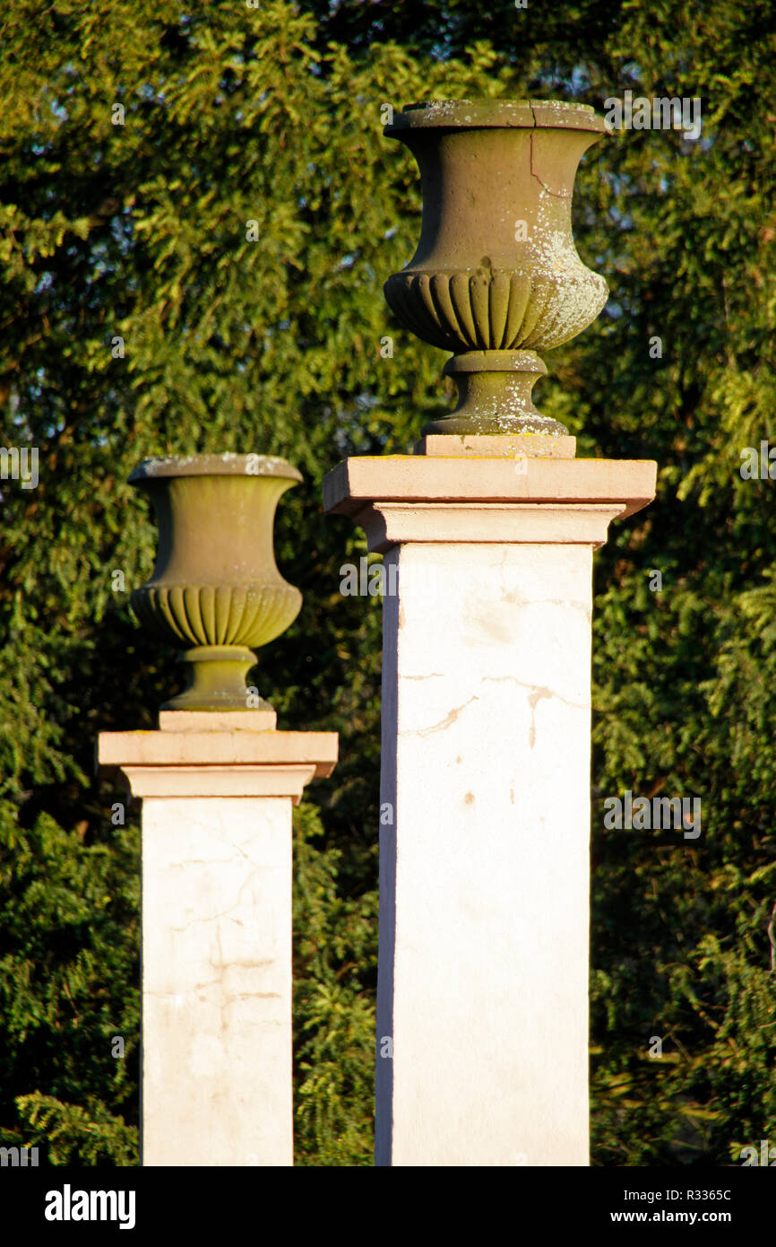 pillar with vase in a park Stock Photo