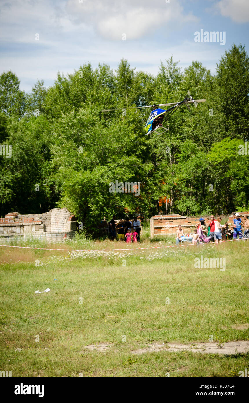 Komsomolsk-on-Amur, Russia - August 1, 2016. Public open Railroader's day. flying helicopter model in amateur competitions Stock Photo