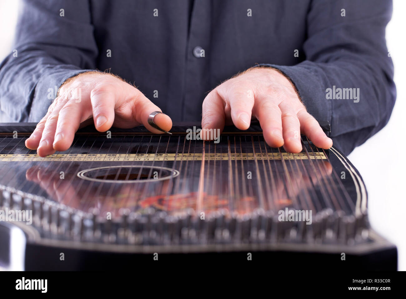 playing zither instrument Stock Photo