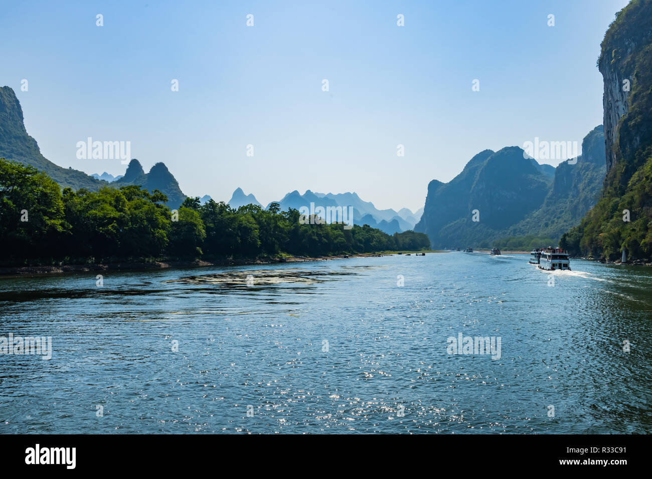 Cruise boats on the Lijiang (Li) river- China Stock Photo