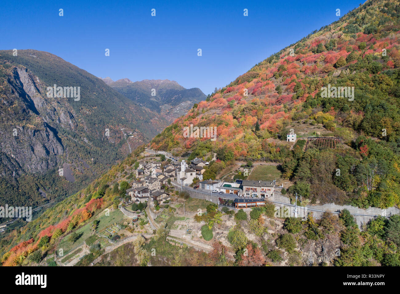 Little village of Roncaiola near Tirano. Mountain village in Valtellina, Autumn landscape. Province of Sondrio. Stock Photo