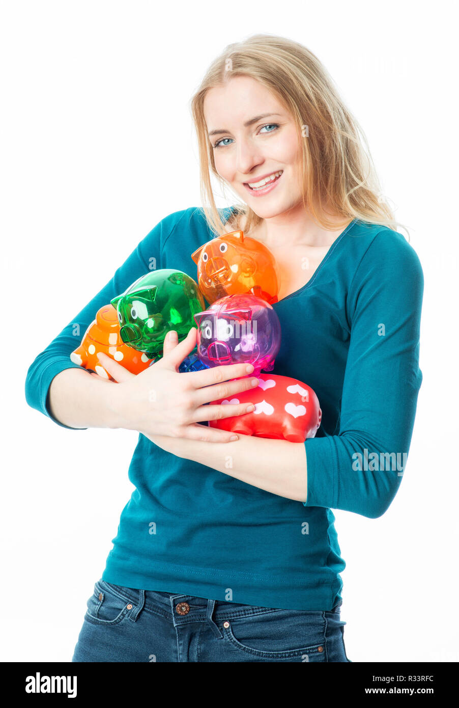 blond girl with piggy banks Stock Photo - Alamy