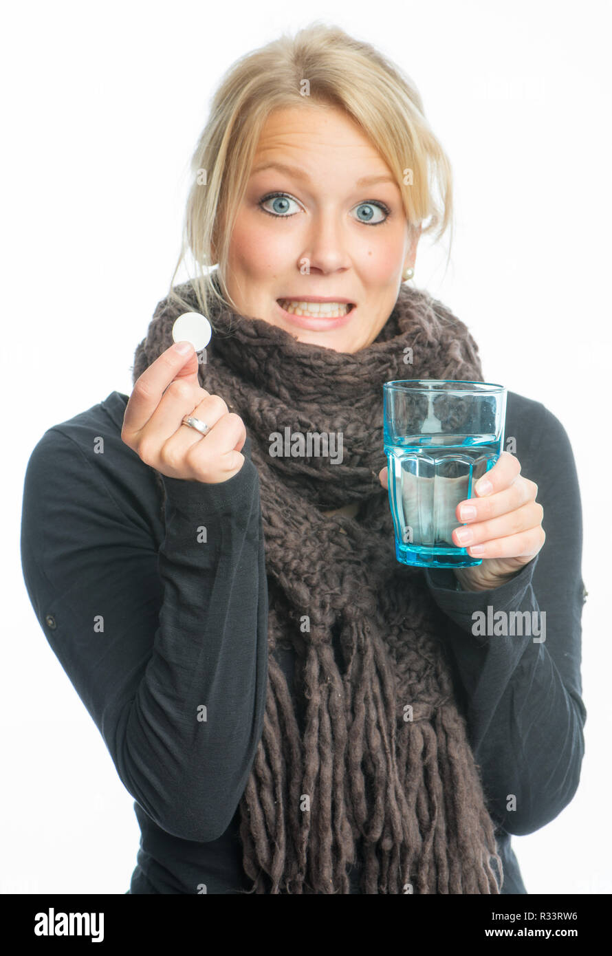 sick blond woman effervescent tablet dissolves in water Stock Photo Alamy