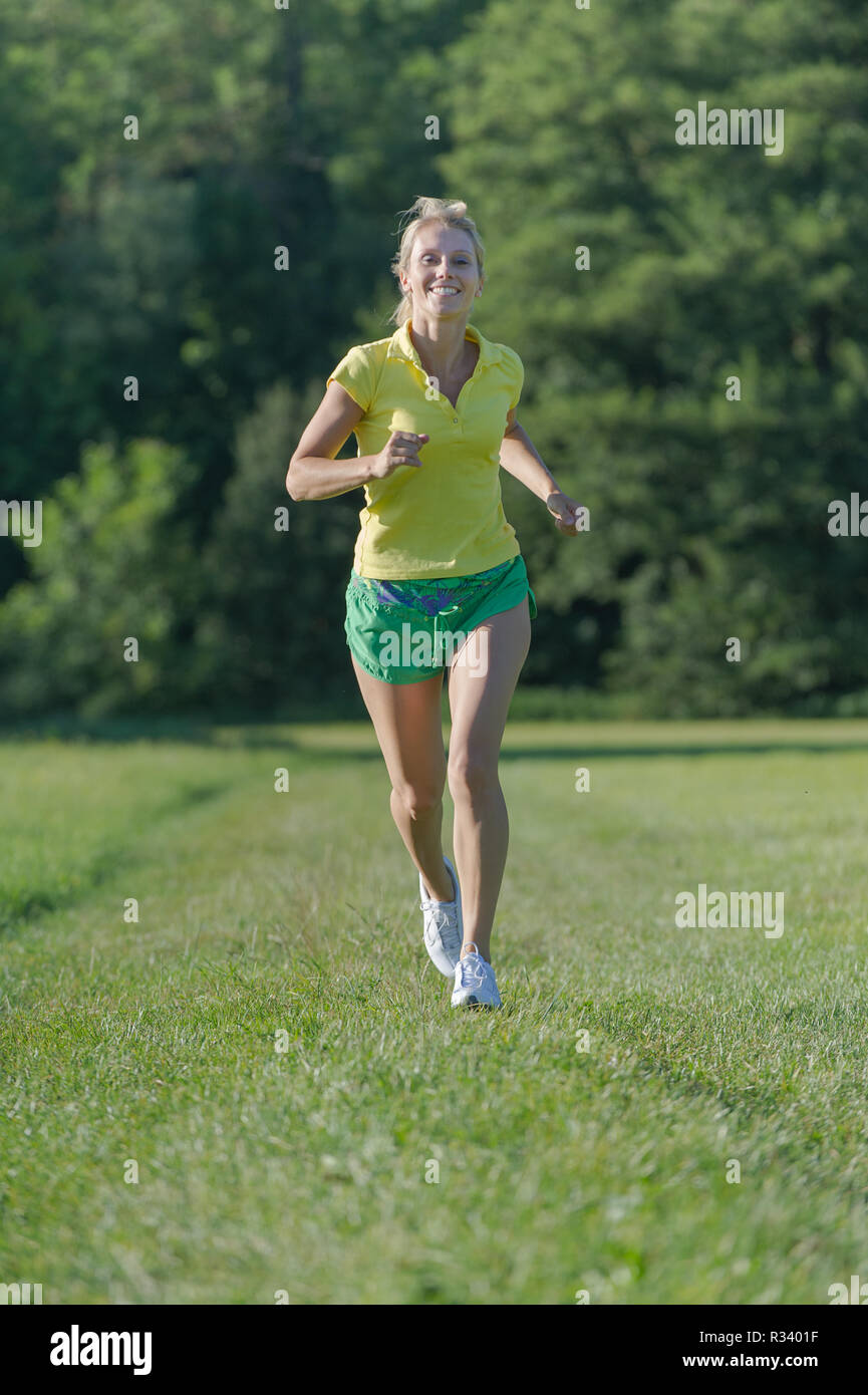 jogging attractive woman in Stock Photo