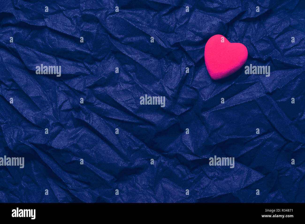 Top View Red Heart On Wrinkled Sapphire Texture Background Happy