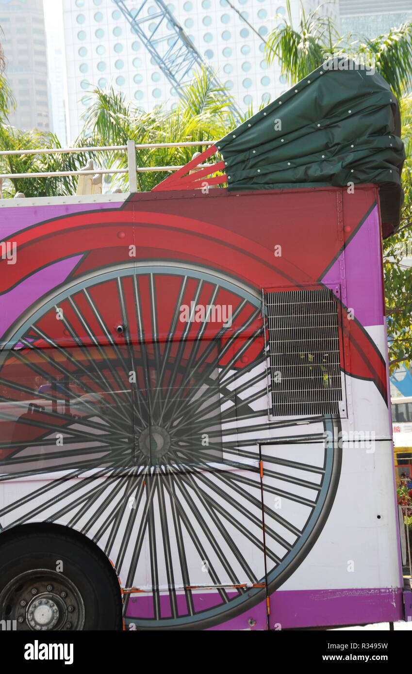 bus with rickshaw painting in hong kong Stock Photo