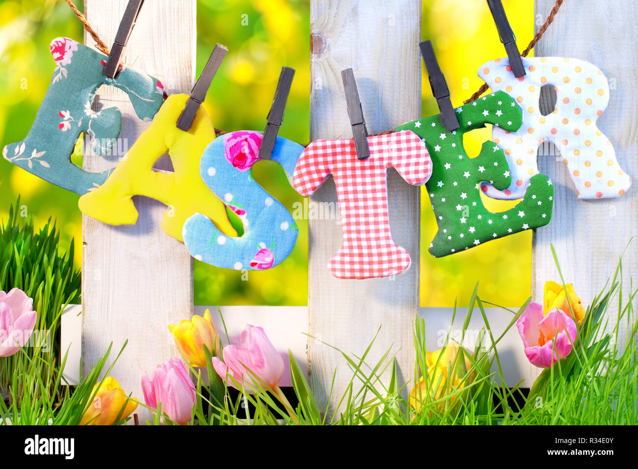 happy easter at the garden fence Stock Photo Alamy