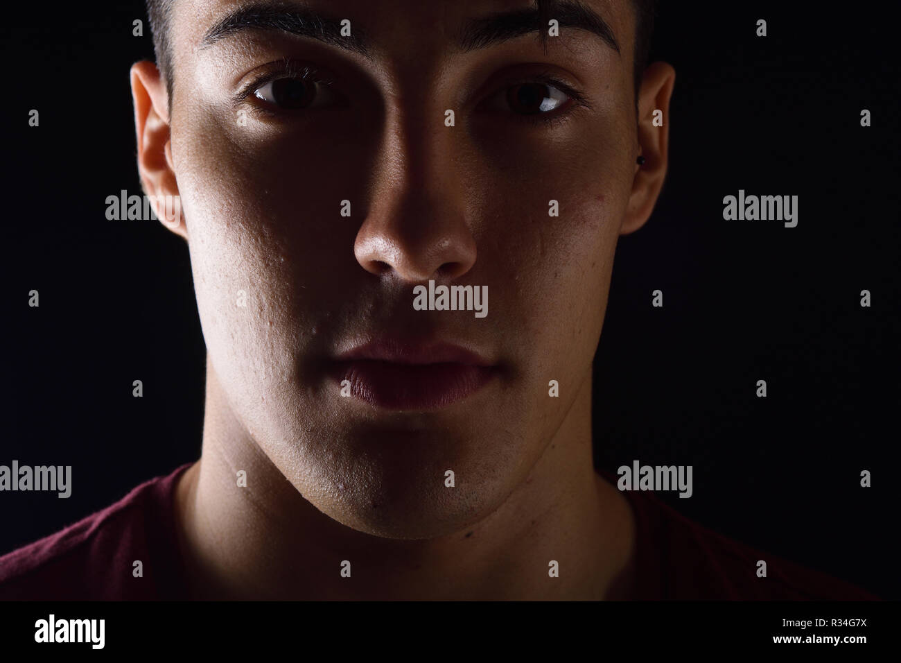 Man portrait dark background hi-res stock photography and images - Alamy
