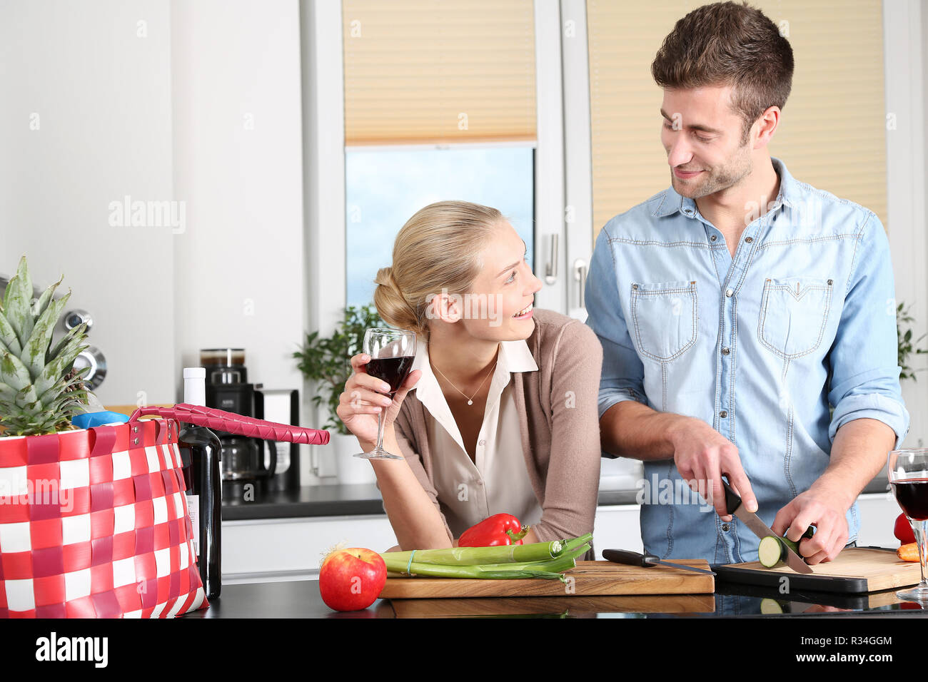 couple in kitchen Stock Photo