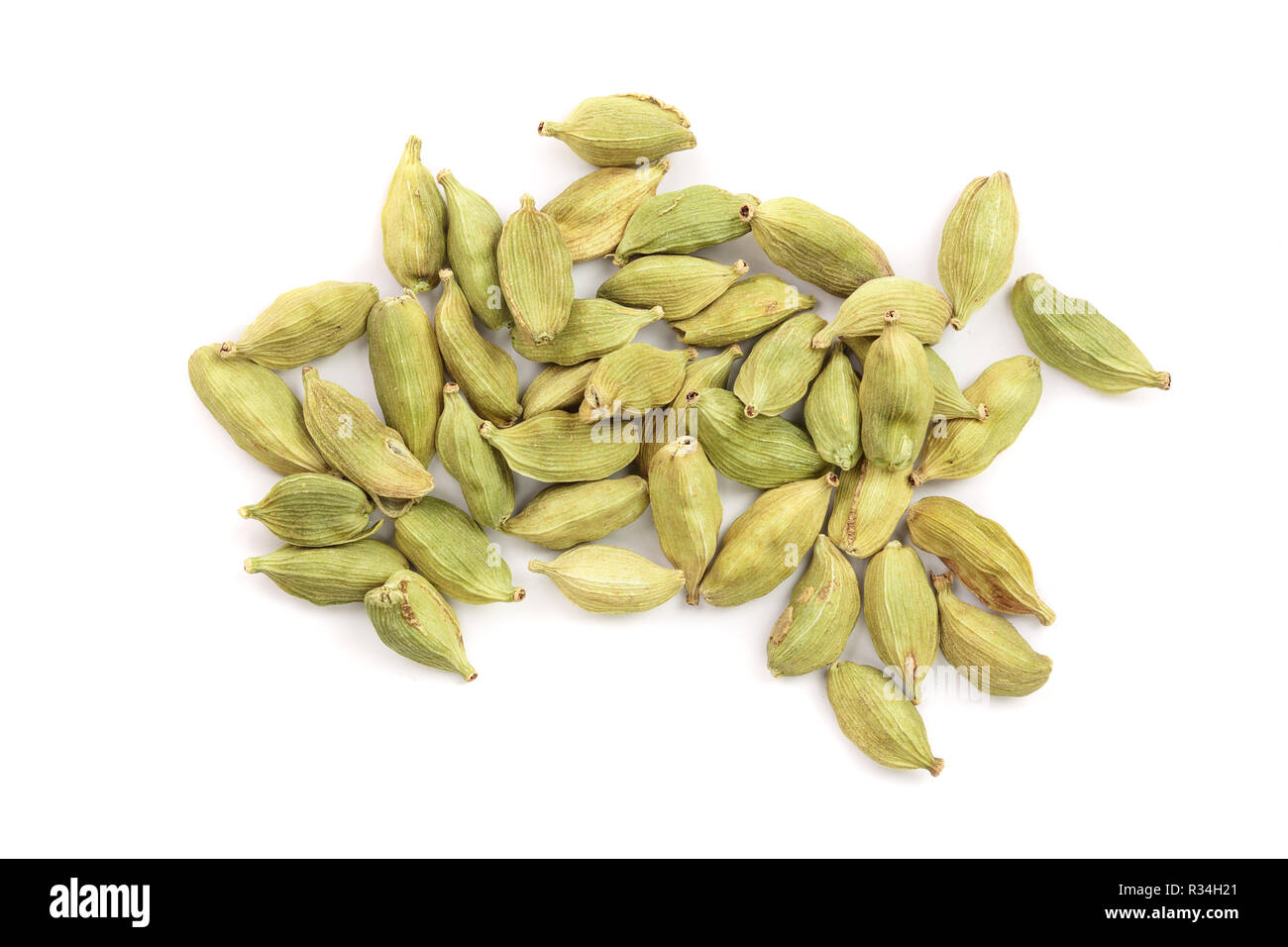 Green cardamom seeds isolated on white background. Top view. Flat lay Stock Photo