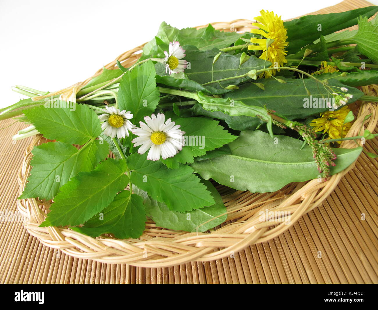 wild herbs in basket Stock Photo