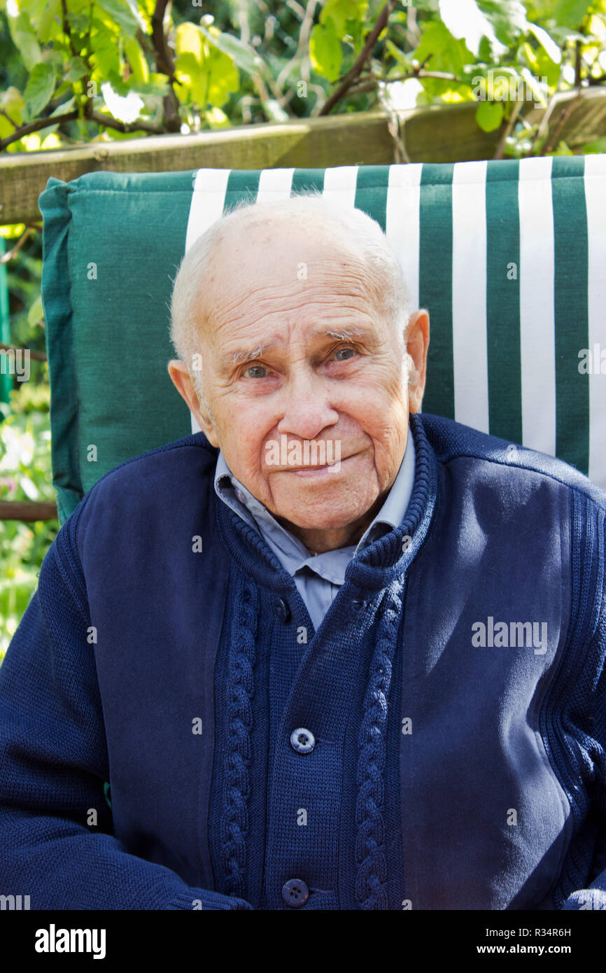 Old man white hair cardigan hi-res stock photography and images - Alamy