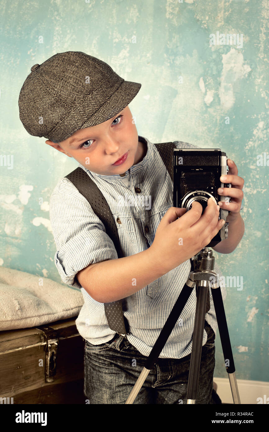 boy with camera - retro look Stock Photo