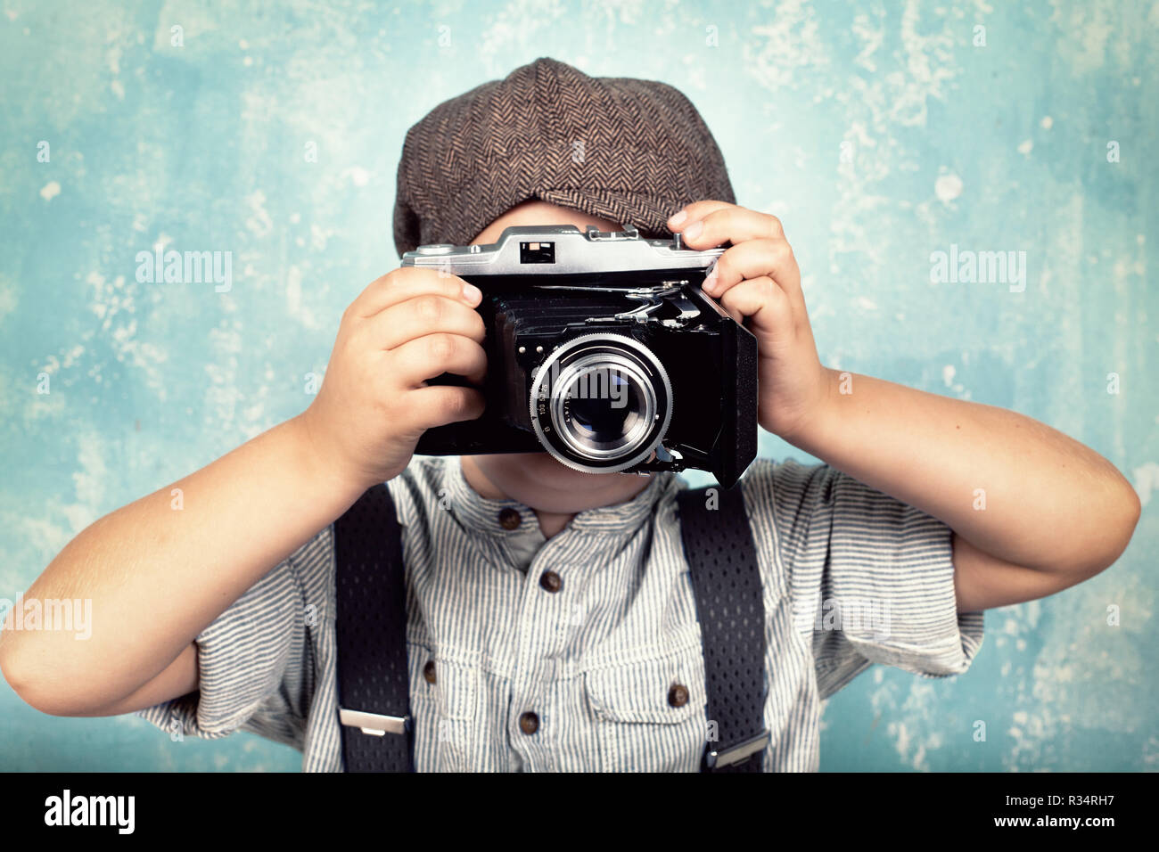 little boy with camera - retro style Stock Photo