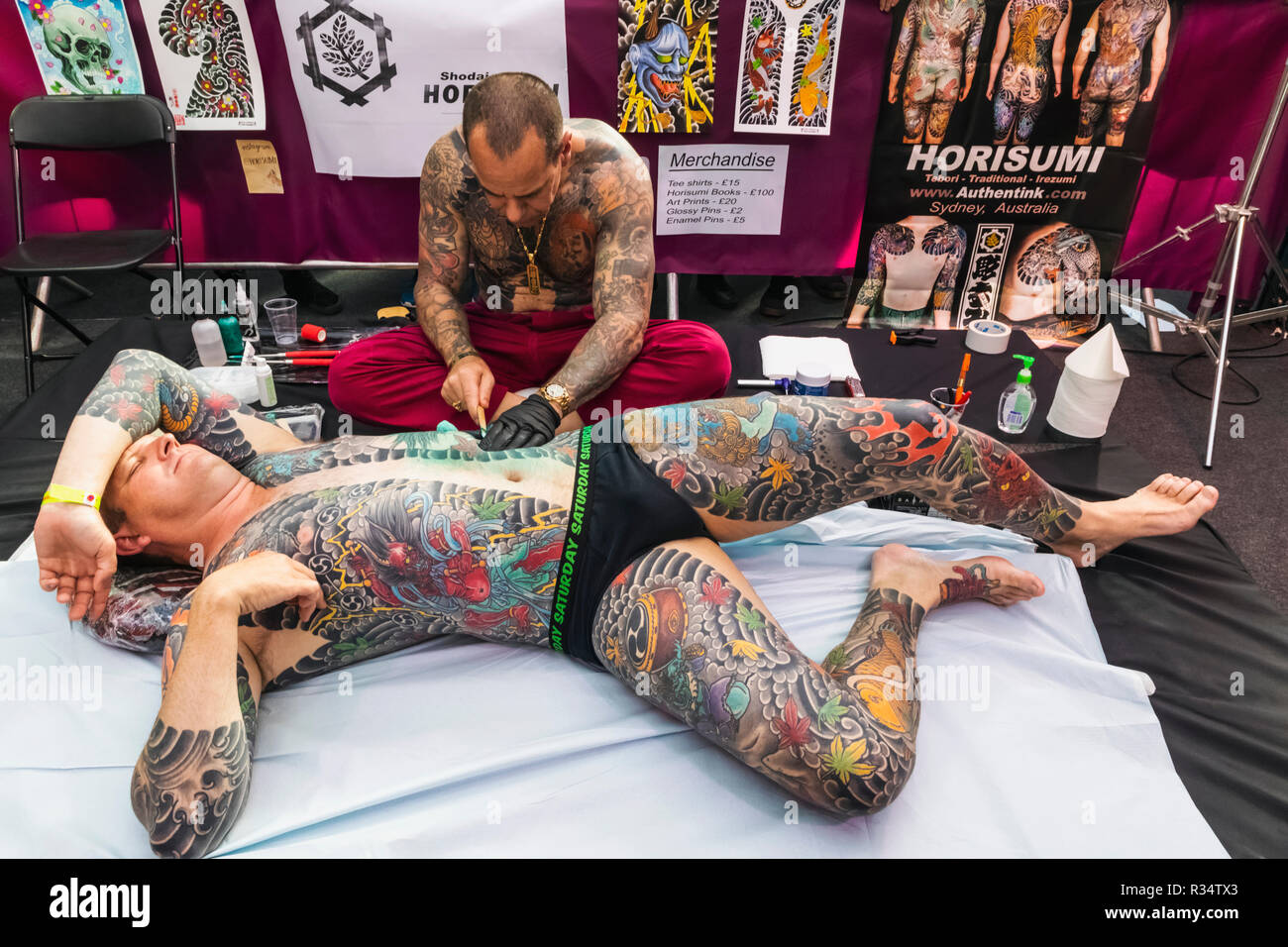 tobacco dock tattoo convention England, London, Wapping, Tobacco Dock, London Tattoo Convention, Tattooing  Stock Photo
