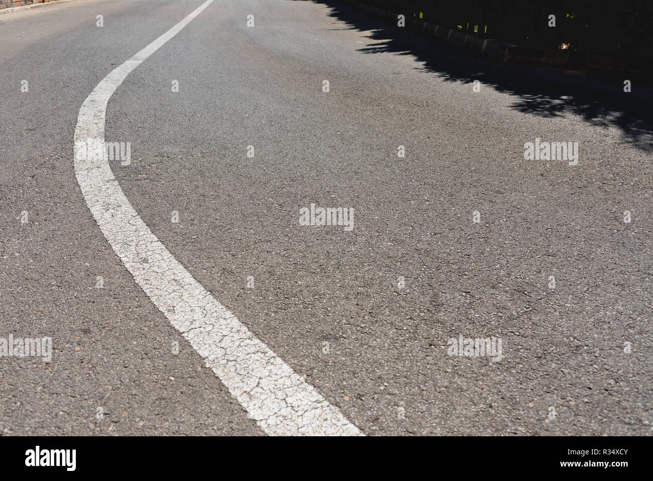 White direction road lines with black background and space for text ...