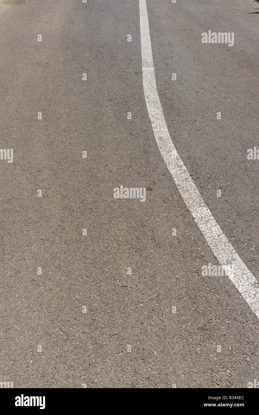 White direction road lines with black background and space for text ...