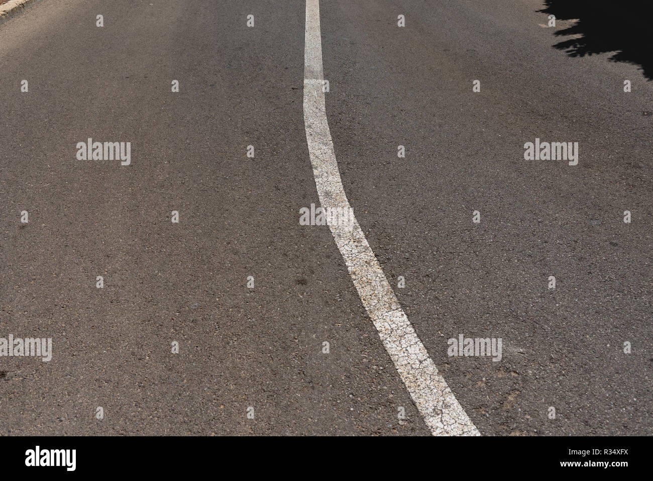 White direction road lines with black background and space for text ...