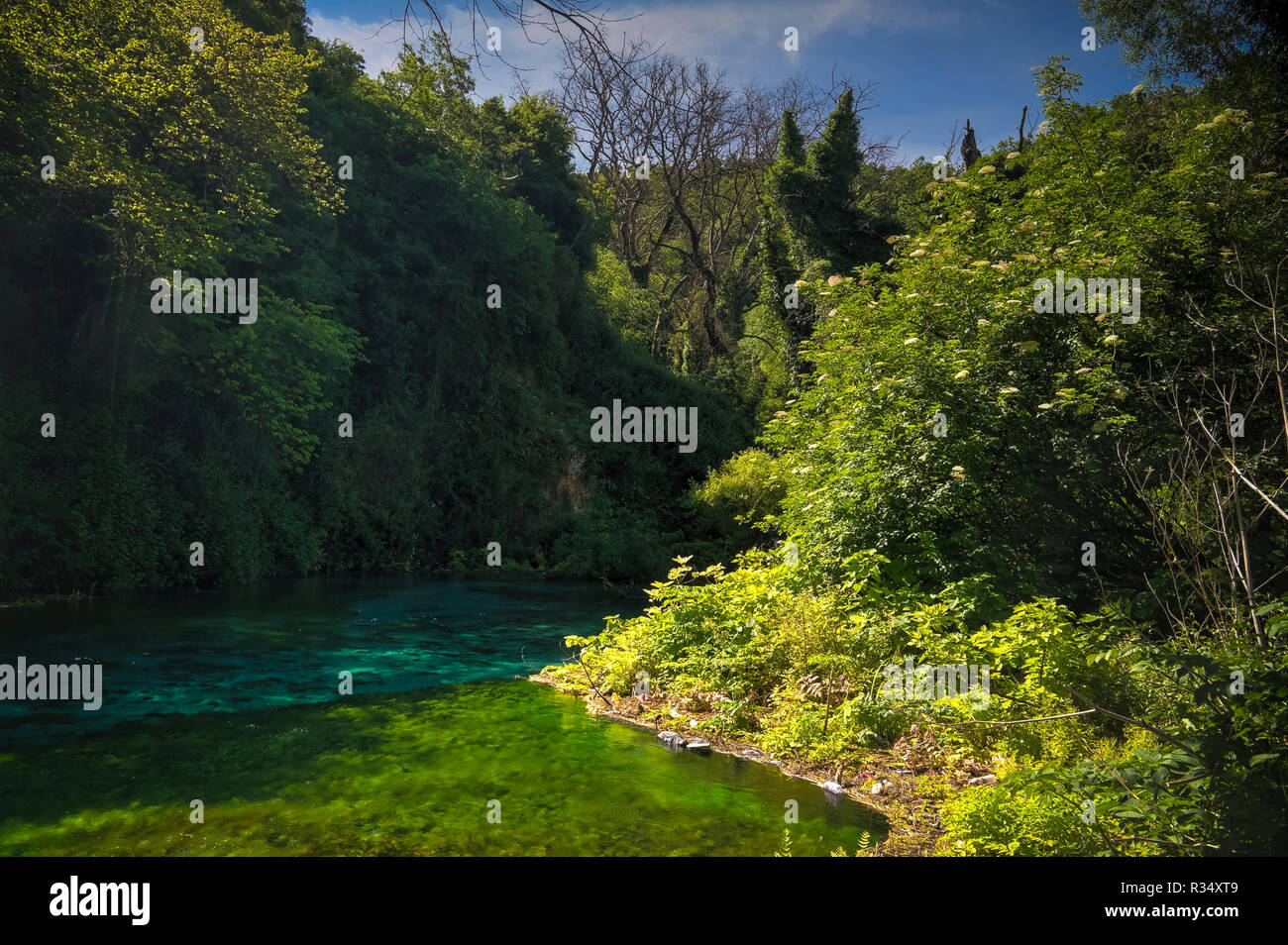 View to Blue Eye spring, initial water source of Bistrice river,near Muzine in Vlore County in southern Albania. Stock Photo