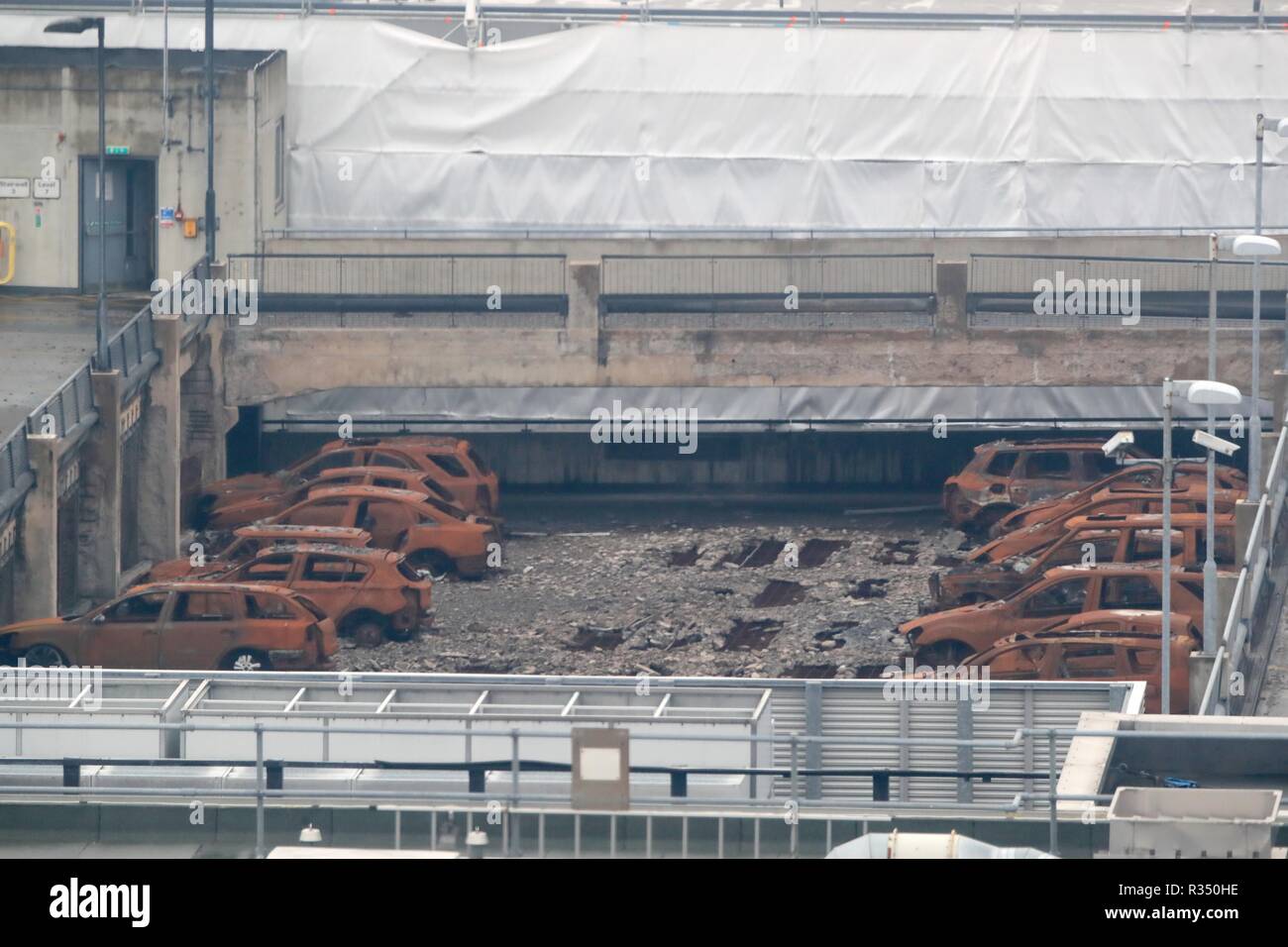 A view of burnt out vehicles on the multi-storey Liverpool Waterfront Car Park near to the Echo Arena which was destroyed by fire on New YearÕs Eve 2017. Work starts on Wednesday to remove almost 1200 cars which were caught in the blaze and to demolish the seven-storey car park. Stock Photo