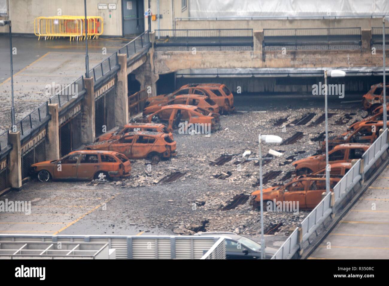 A view of burnt out vehicles on the multi-storey Liverpool Waterfront Car Park near to the Echo Arena which was destroyed by fire on New Year&Otilde;s Eve 2017. Work starts on Wednesday to remove almost 1200 cars which were caught in the blaze and to demolish the seven-storey car park. Stock Photo