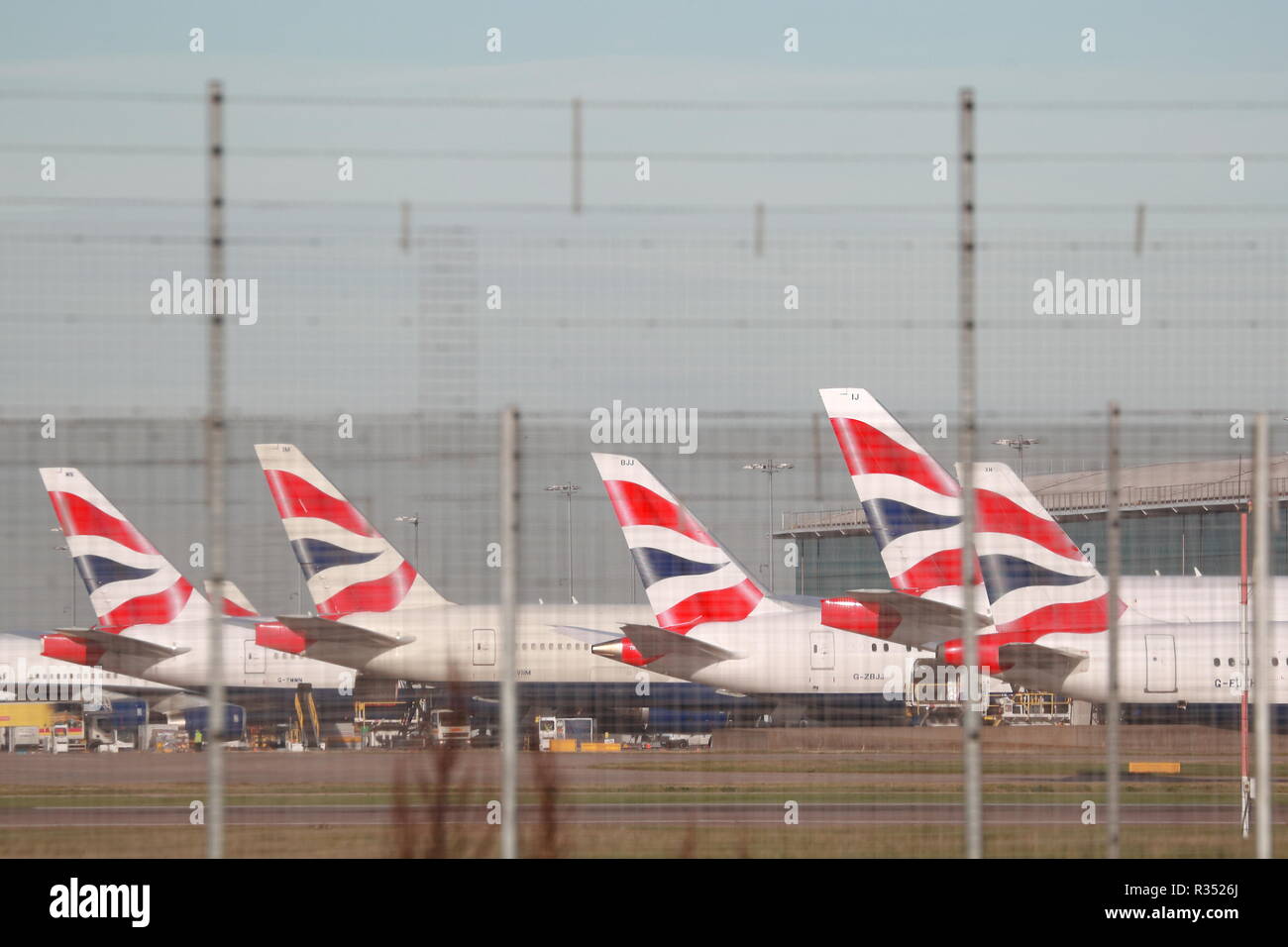 British Airways planes lined up at the terminal at London Heathrow Airport, UK Stock Photo