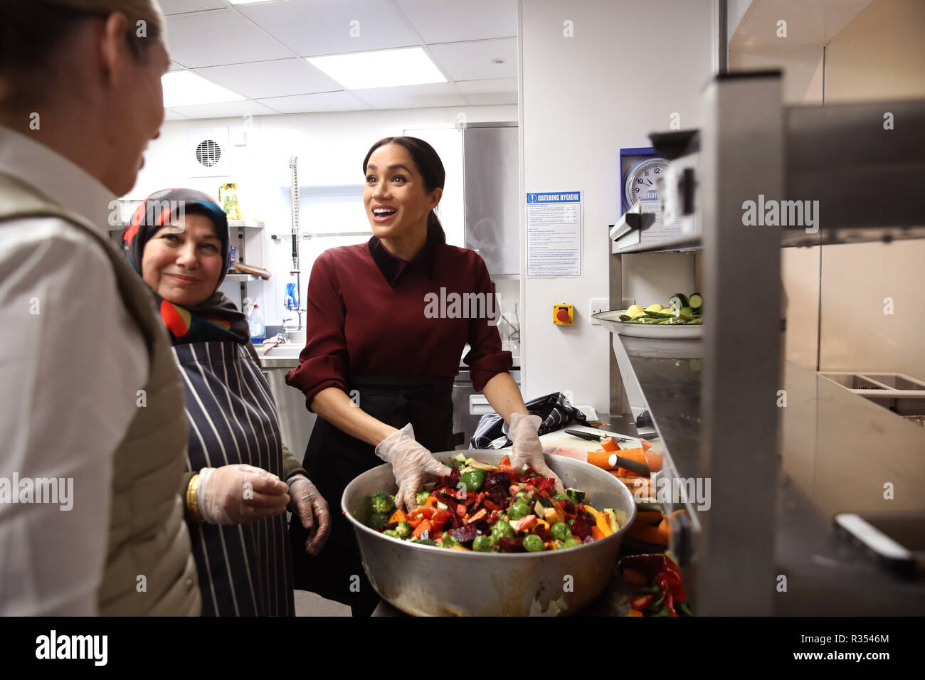 The Duchess Of Sussex Right Talks To Chef Clare Smyth Left
