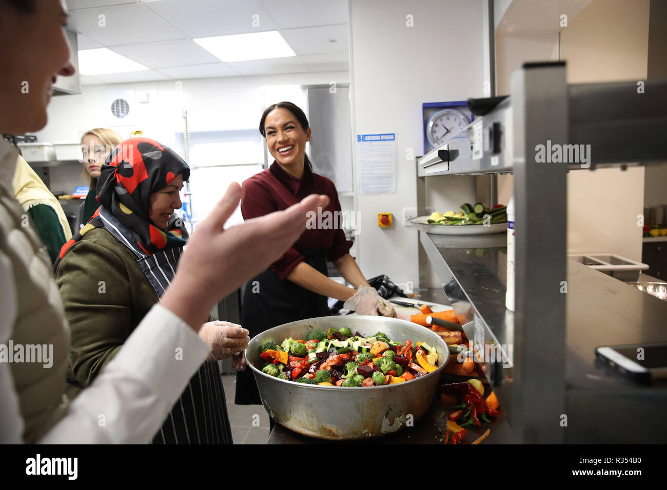 The Duchess Of Sussex Helps Prepare Food During Her To Visit The