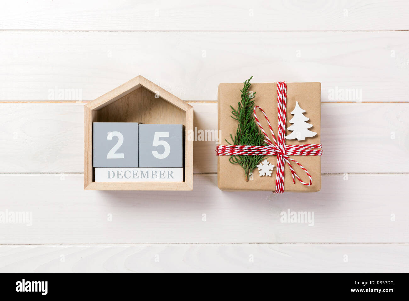 Calendar with date 25 december and gift boxes on color background ...
