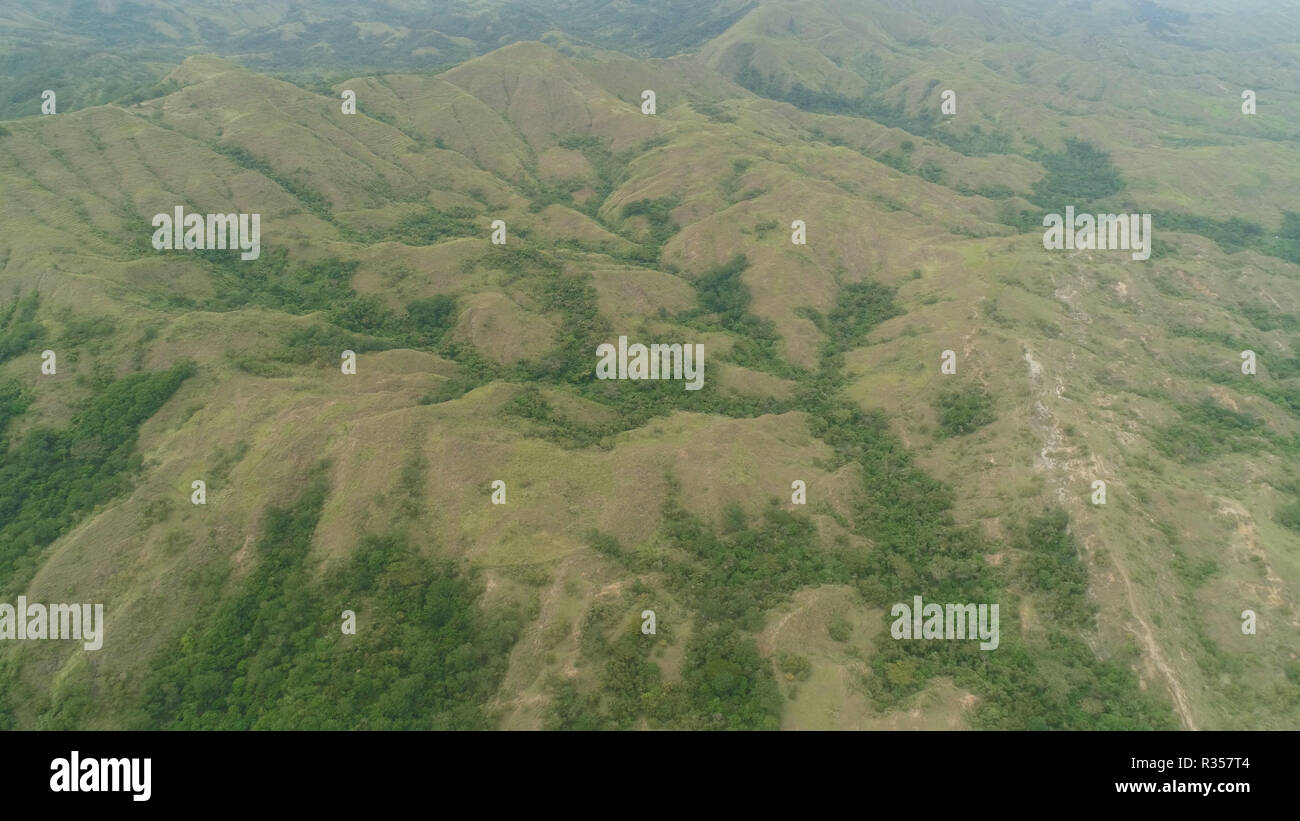 Aerial view of mountains covered forest, trees. Cordillera region